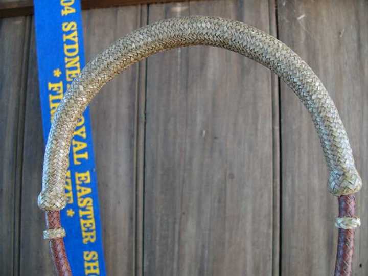 Picture 137-1.jpg - 1st @ Sydney Royal Easter Show 2004 ~ Standard Of Excellence Award
1/4" Pencil Bosal ~ 12 Plait Kangaroo hide cheeks with a 6 string Rawhide nose & heel knot.